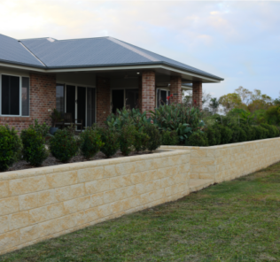 New_home_with_metre_high_retaining_wall_in_sandstone_look