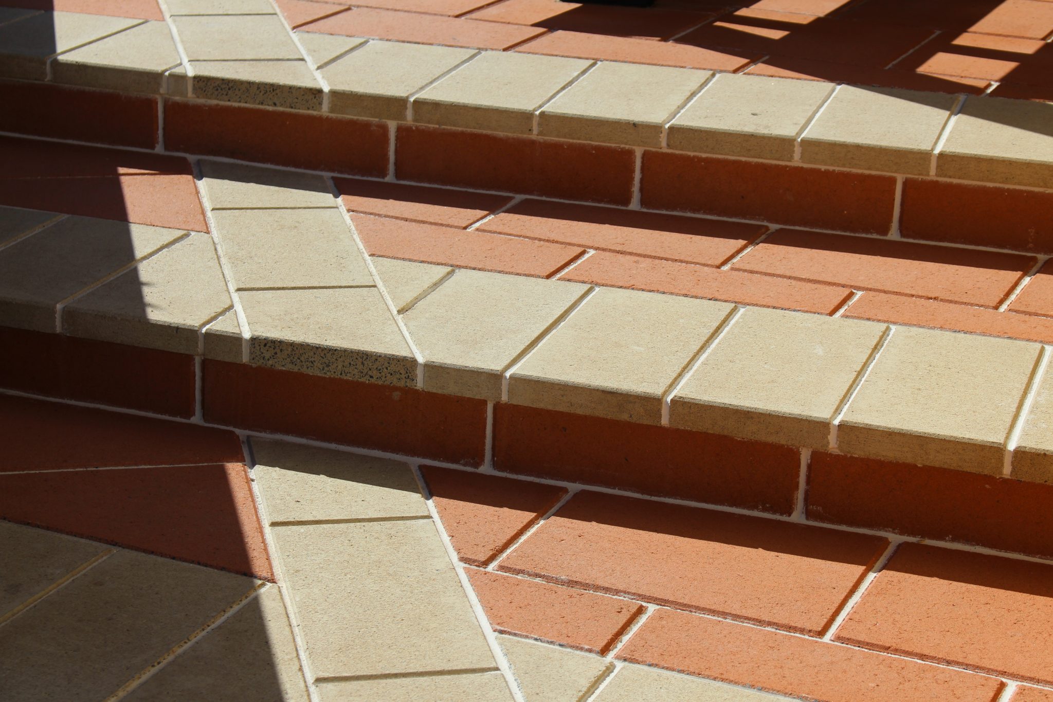 Steps_with_a_unique_design_using_Ivory_&_Canyon_Coloured_Pavers