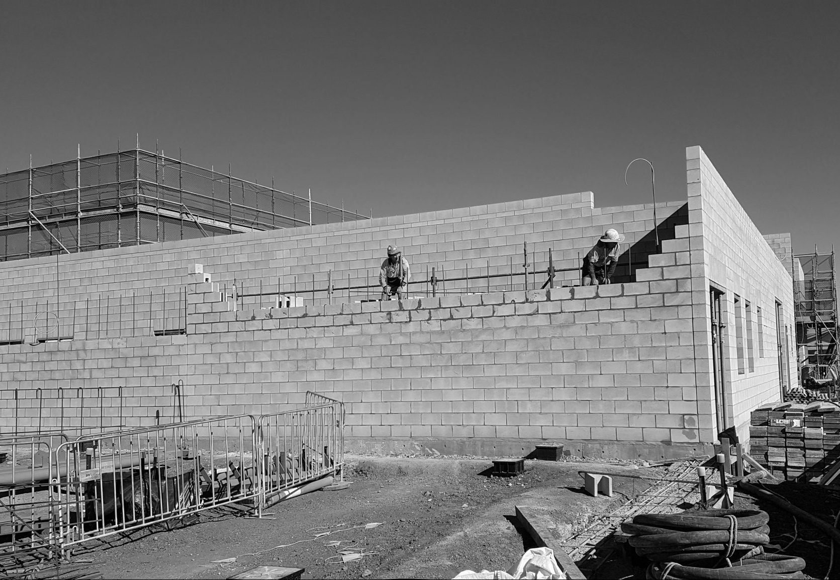 The_history_of_Besser_Block_captured_on_a_construction_site_where_grey_masonry_block_is_being_laid