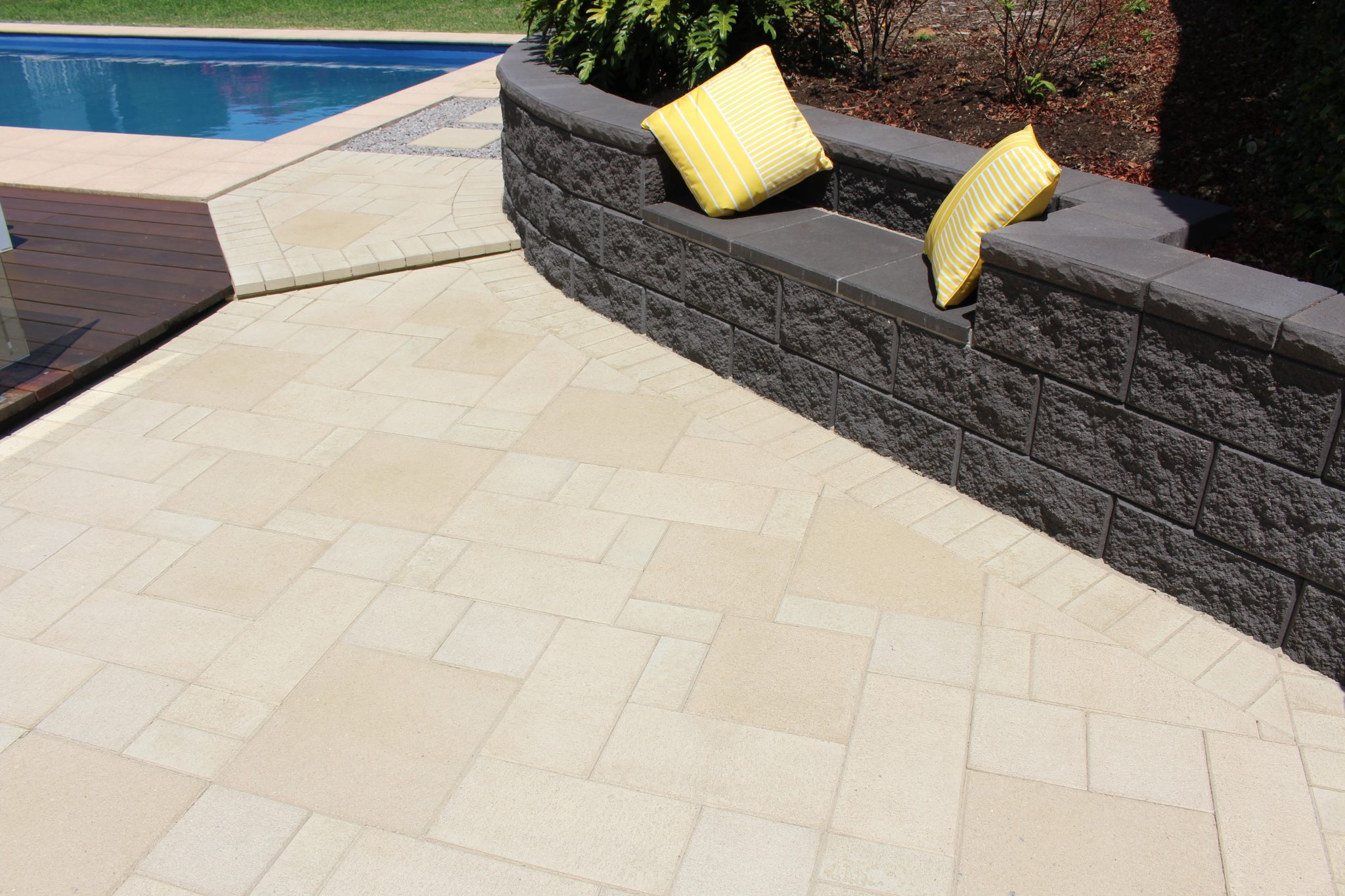 French_pattern_paved_pool_area_reason_to_use_pavers_instead_of_a_slab