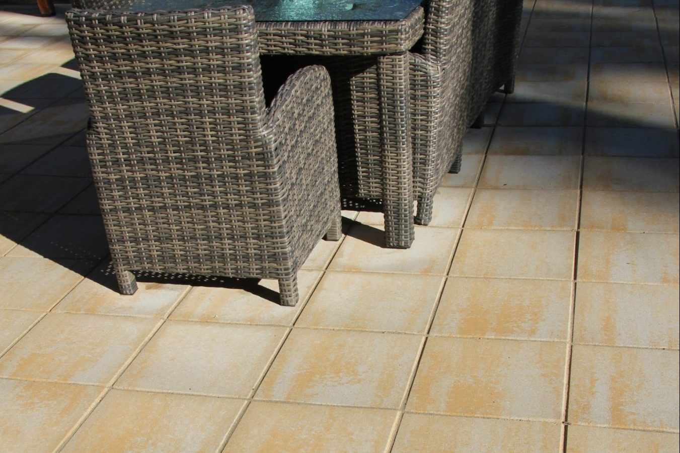 Clean_concrete_pavers_without_weeds_used_for_a_patio.